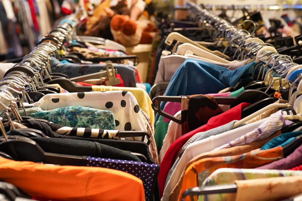Thrift store racks with a wide selection of clothing